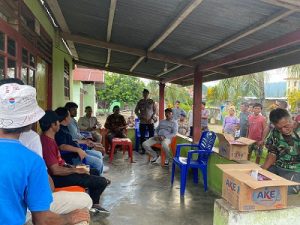 DPRD Malut- Sat Brimob Kupa-Kupa Sambangi Warga Peleri dan Wangeotak