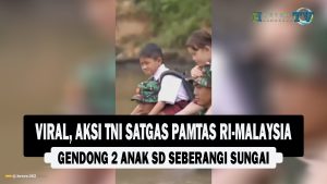 VIDEO : Viral, Aksi TNI Satgas Pamtas RI Malaysia Gendong 2 Anak SD Seberangi Sungai