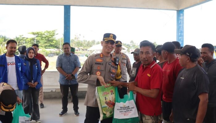 Peduli Kaum Buruh, Kapolres Halsel Bersama OKP-LSM Berbagi Sembako